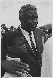 Jackie Robinson with his son at the March on Washington August 28,1963