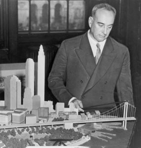 Moses with a Model of the never built Battery Bridge In 1939. 
