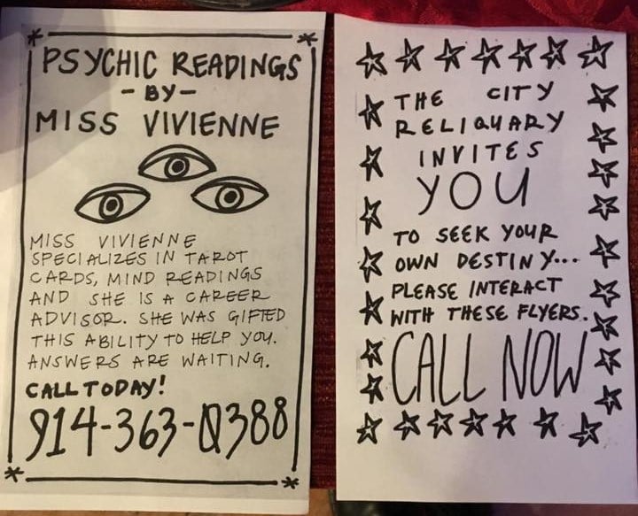 Hand-drawn flyers advertising psychic advice by phone, created by the exhibit designers.