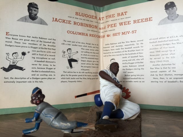 Jackie Robinson figurines, 1947 (left) and late 20th century (right). From the collection of Howard Warren.