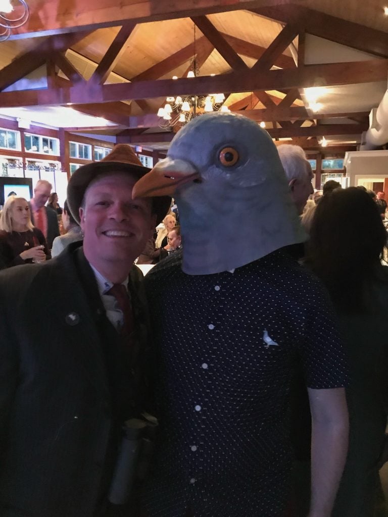 Gabriel has a cool hat. Jacob is wearing a pigeon head mask by Archie McPhee.