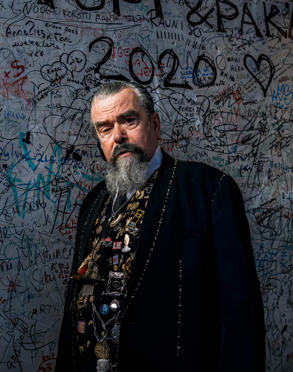 Joe Coleman in a coat and highly decorated vest